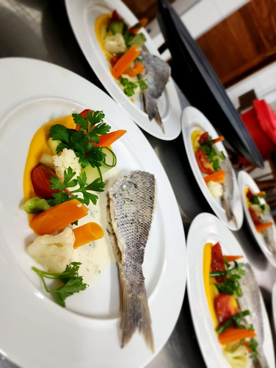 A row of carefully prepared dishes ready for service